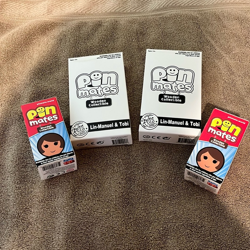 Two sets pin mates unopened 2018 debut Comic Con white boxes the same red boxes?